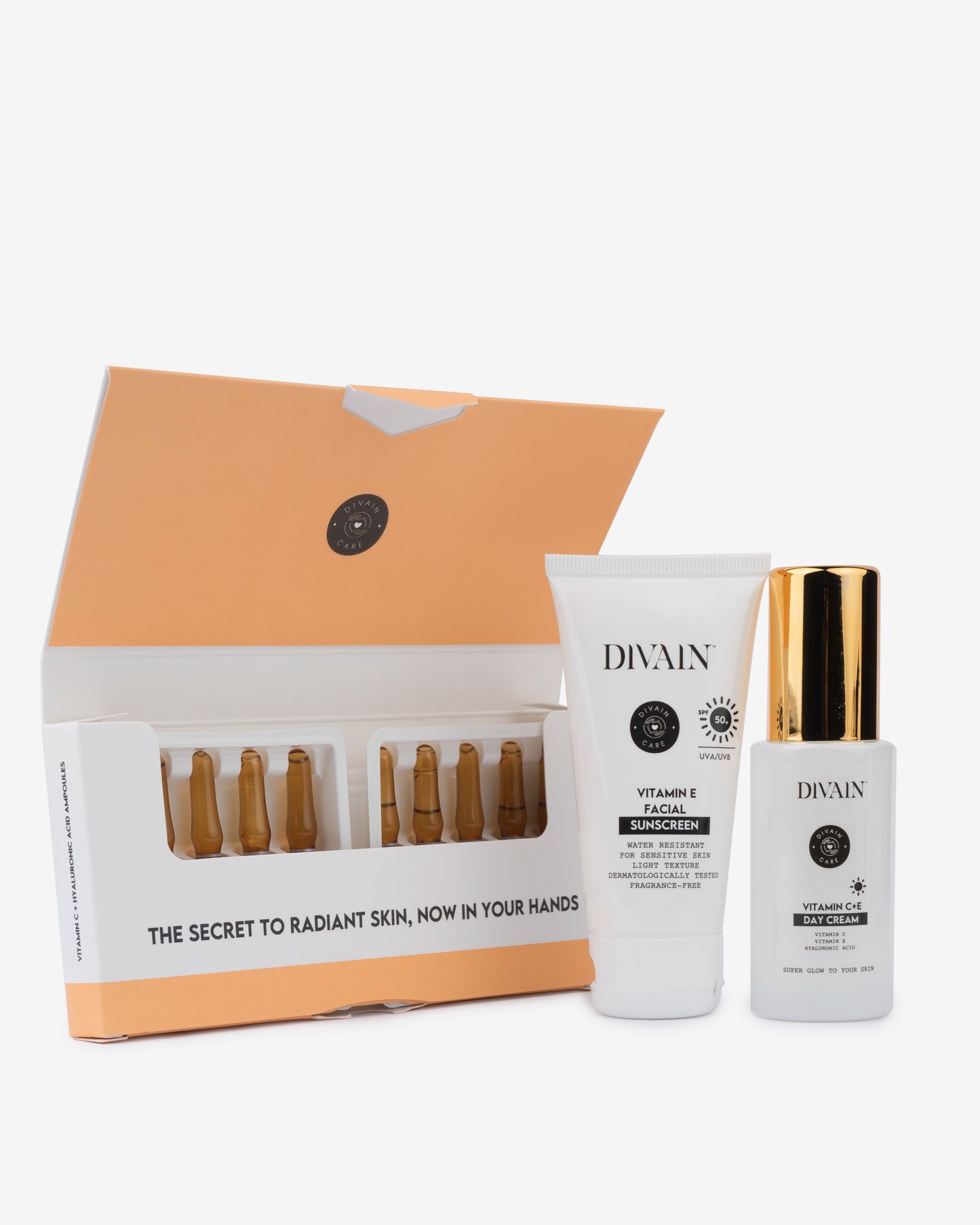 Anti-spot treatment pack containing facial ampoules, a moisturising cream and a facial sunscreen.